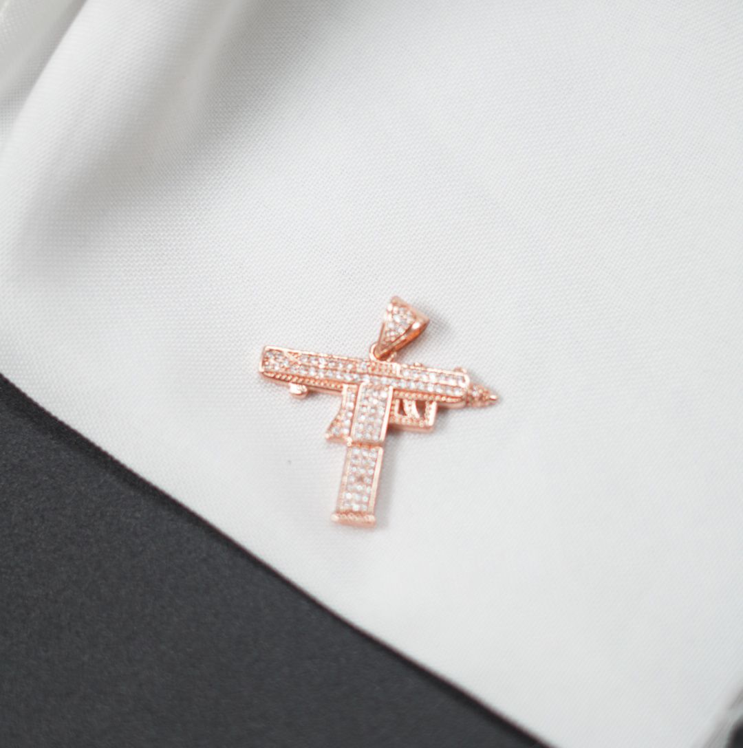 Miniatura 3 de DIJE PISTOLA UZI ROSADA PIEDRAS BLANCAS